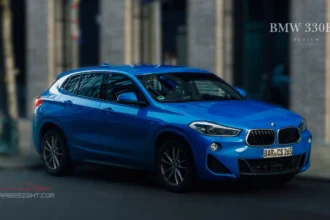 BMW iX2 electric SUV in blue, highlighting sleek exterior design, advanced technology, and dynamic performance.