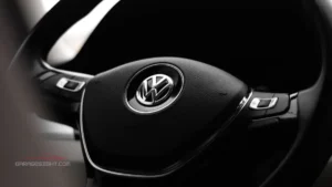 VW Multivan steering wheel with integrated multifunction controls, showcasing a premium interior design and comfortable driving experience.